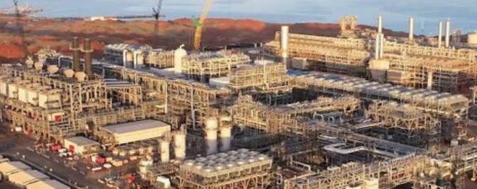 Aerial view of Woodside's Pluto LNG plant on the Burrup Peninsula, integrated with the North West Interconnected System
