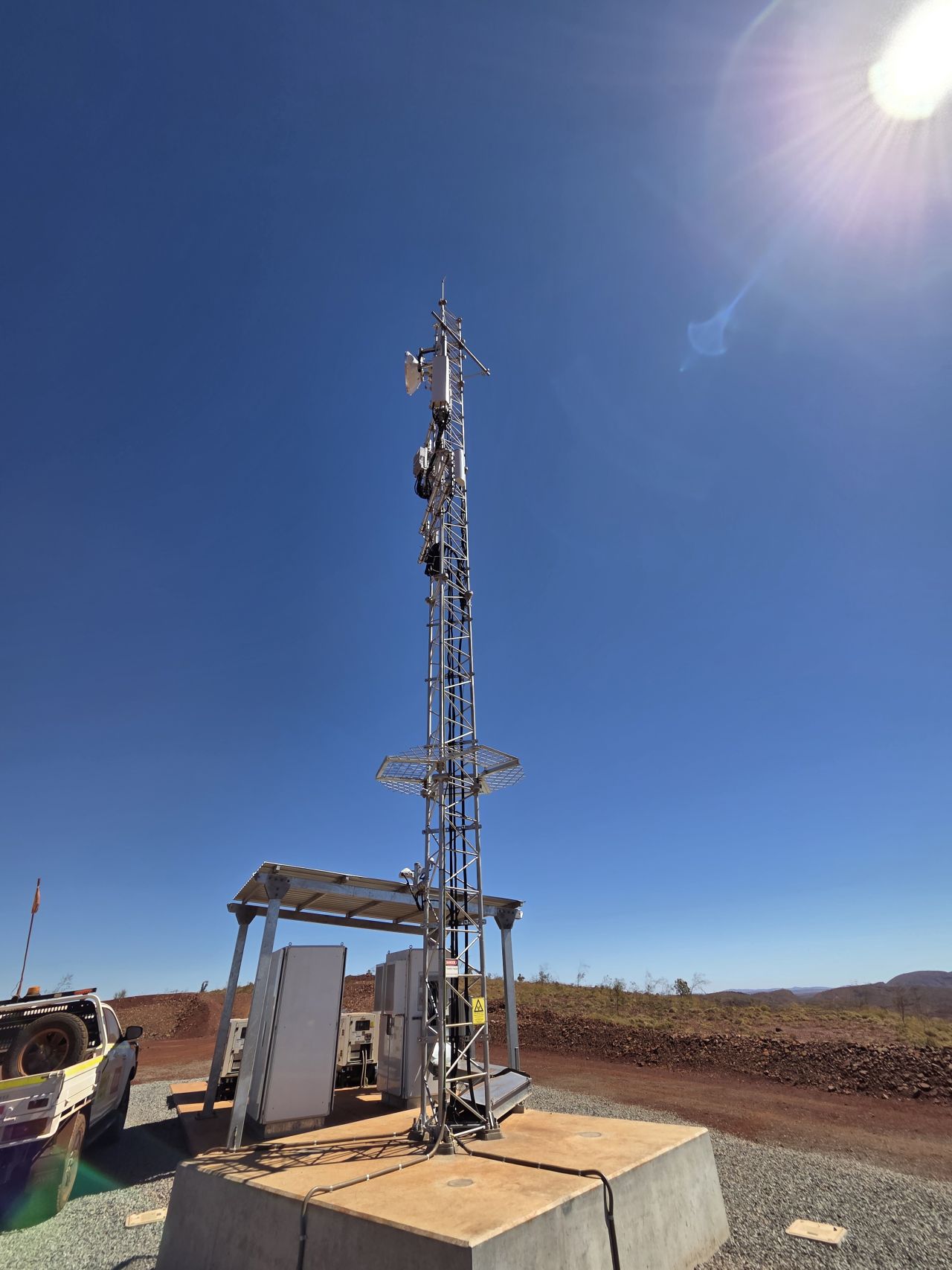Lattice communications tower on a mining site